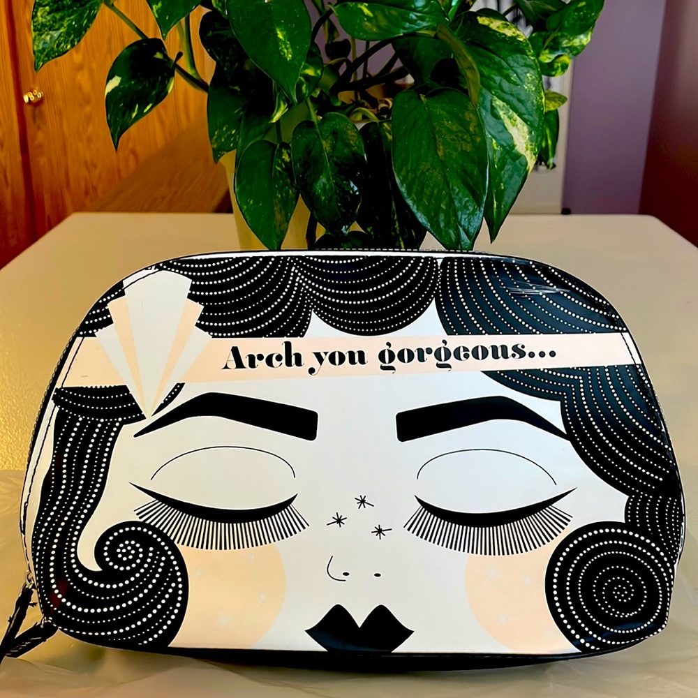 Cosmetic bag/brows dome bag by Benefit